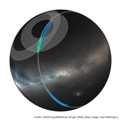 The rapid Hanford-Livingston localization of GW170817 is shown in in blue, and the final Hanford-Livingston-Virgo localization is in green. The gray rings are one-sigma triangulation constraints from the three detector pairs.